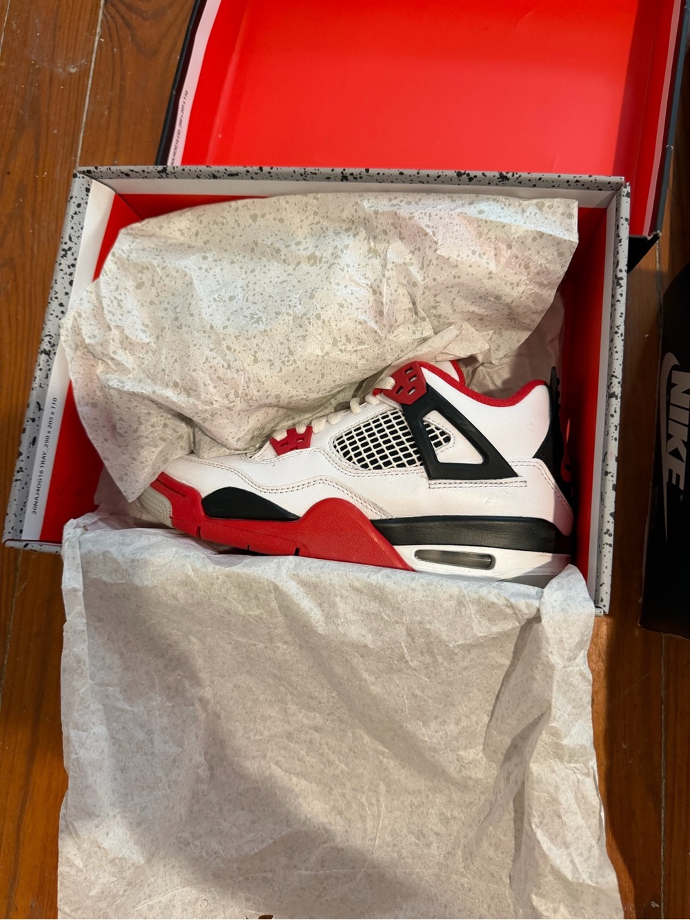 Kids Nike Air Jordan 4 retro 'Fire Red' sneakers